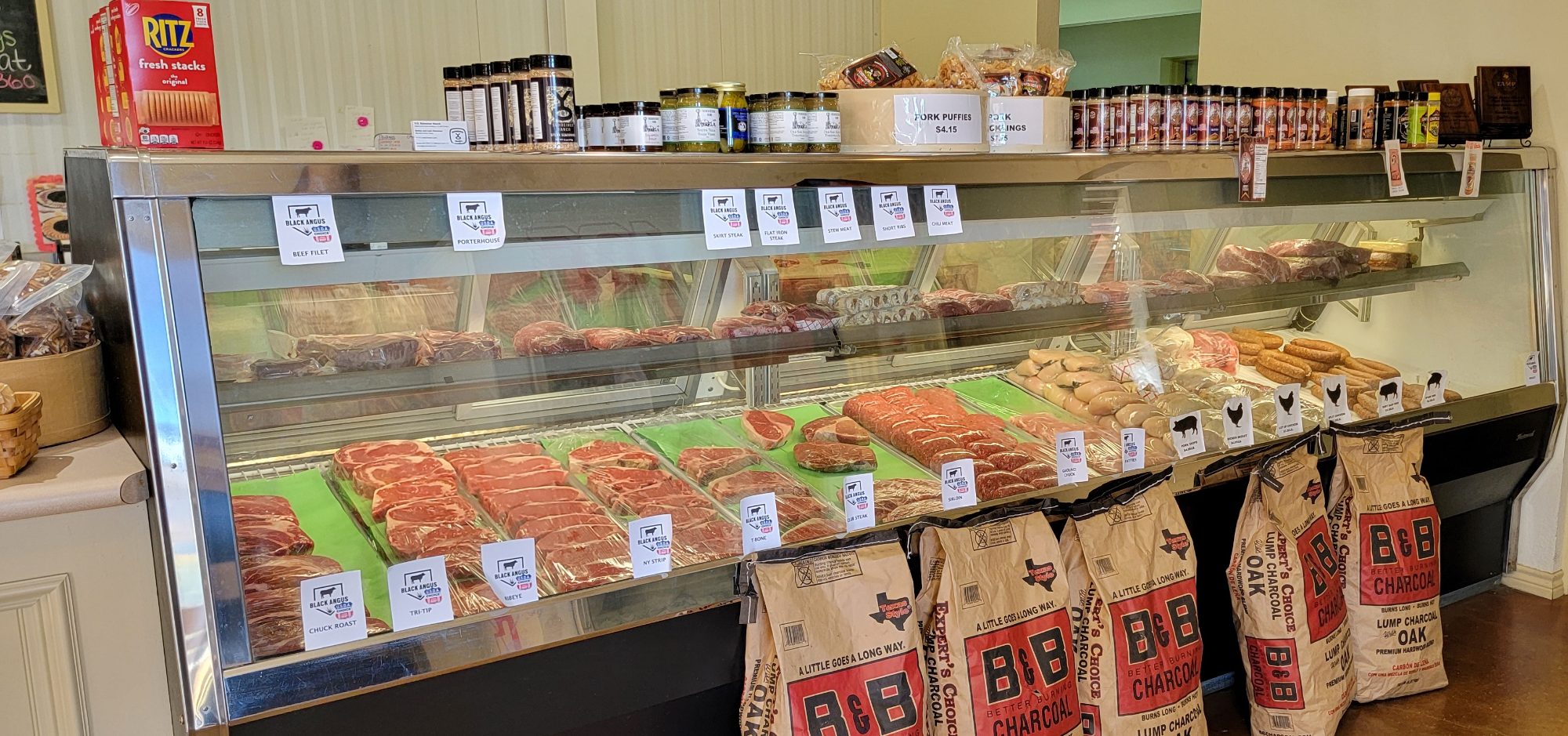 Fresh-cut beef and pork in the meat case